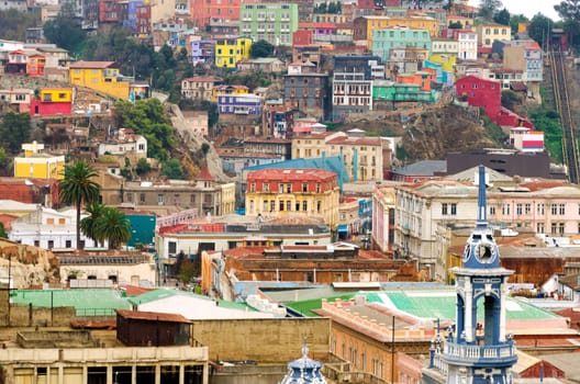 The old city of Valparaiso, Chile smiles down at the port area