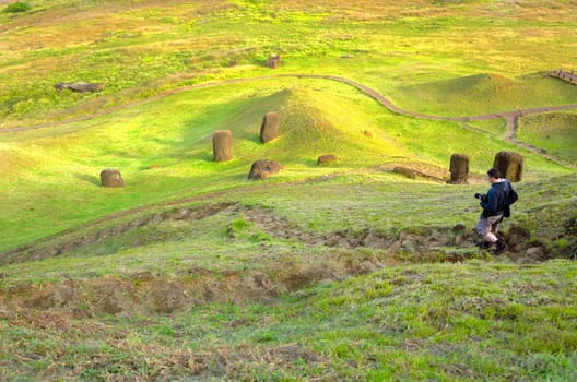 Photographer walking down stairs on Easter Island, Chile