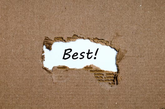 The word best appearing behind torn paper