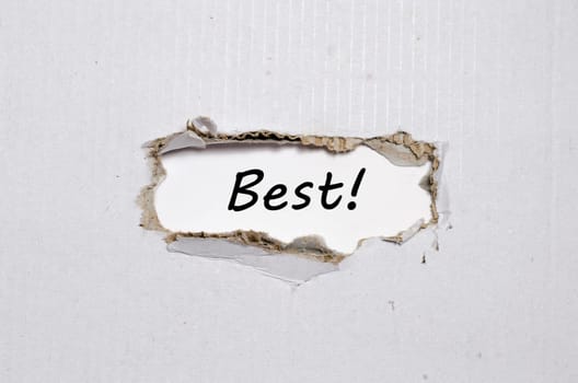 The word best appearing behind torn paper