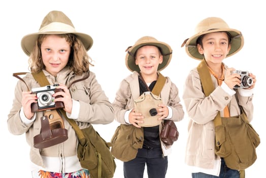 Group of kids having fun with cameras in safari clothes