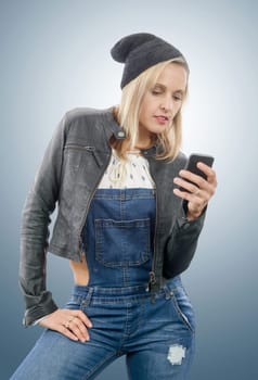 beautiful blond middle-aged woman with phone
