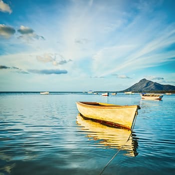 Fishing boat at sunset time. Mauritius