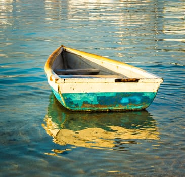 Old fishing boat at sunset. Mauritius