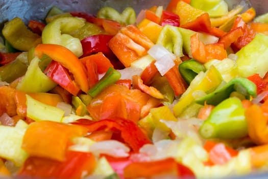 Cooking stew with fresh vegetables in a pot