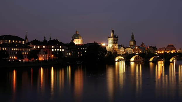 City view of Prague with Charles Bridge at night