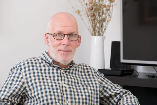 Portrait of smiling handsome mature man
