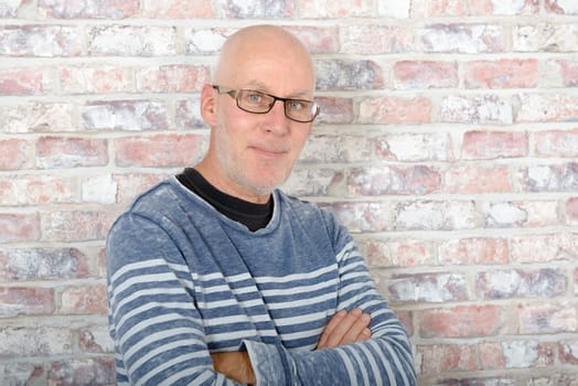 Portrait of smiling handsome mature man