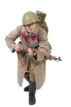 young Soviet soldier with winter uniform isolated on the white background