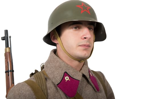 young Soviet soldier with winter uniform and rifle