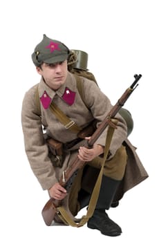 young Soviet soldier with winter uniform isolated on the white background