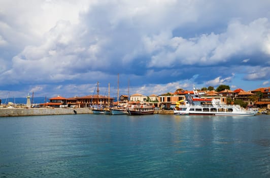 Nesebar, Bulgaria, September 06, 2013: Pleasure boats and yachts in the harbor of the old town of Nessebar on the bulgarian Black Sea boast. Sunny summer day.