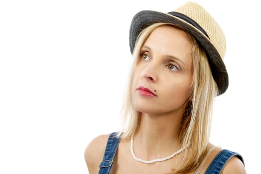 Portrait of beautiful blond woman  posing with summer hat