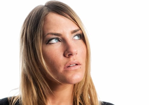 Blonde woman in portrait looks thoughtful