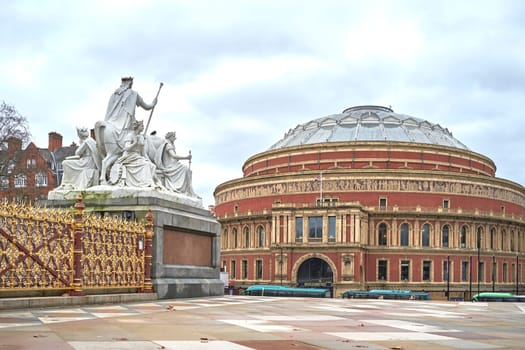 LONDON, UK - DECEMBER 17: Detail of Albert Memorial statue looking at Royal Albert Hall in the background, in Kensington Gardens. December 17, 2014 in London.