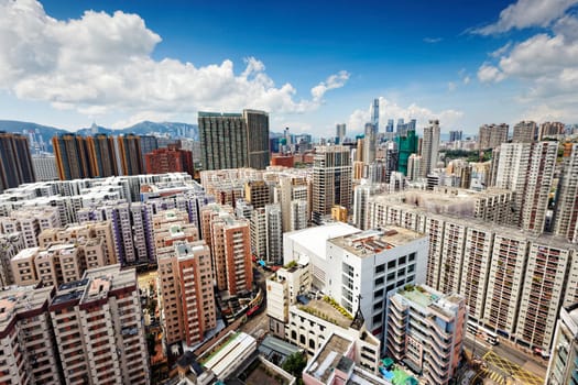 Hong Kong business center with a clear blue sky