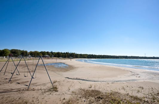 Abandoned Playground on beach Lake Huron autumn