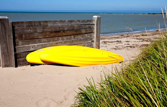 Yellow Kayak on shore on Lake Huron Ontario