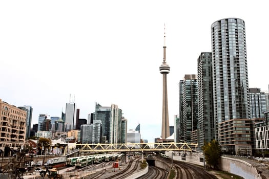 Daytime Photos of Toronto Ontario buildings downtown go train and tracks