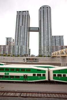 Daytime Photos of Toronto Ontario buildings downtown go train and tracks