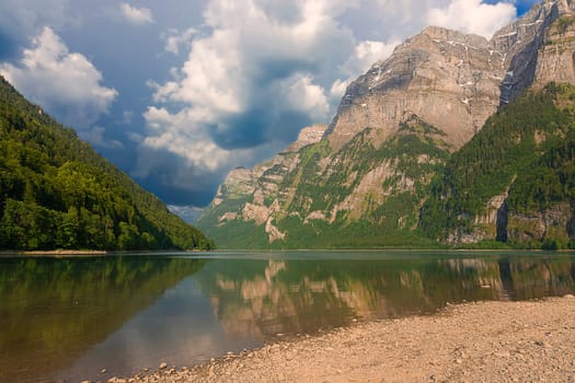 Klöntalersee with thunderstorm sky