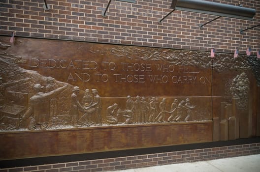 NEW YORK - MAY 2, 2016: Memorial wall close to ground zero. It's dedicated to the 343 members of the NYFD who died on 9/11.