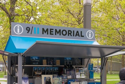 NEW YORK - MAY 2, 2016: Unknown tourists at an information stand at ground zero