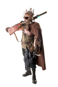 Futuristic soldier posing with gun and armor isolated in white