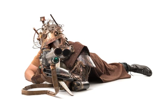 Futuristic soldier posing with gun and armor isolated in white