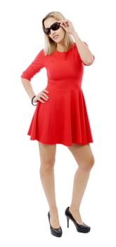 middle aged woman in red dress with sunglasses