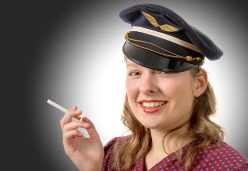 young blonde woman with a military cap