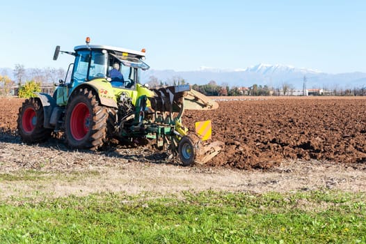 Tractor plowing a field