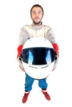 Racing driver posing with helmet isolated in white