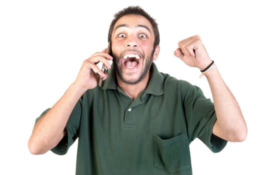 young man with cellphone doing funny faces isolated in white