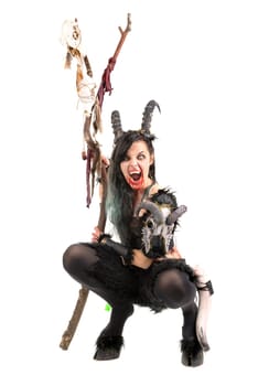 Faun sorceress with big horns and blood isolated in white