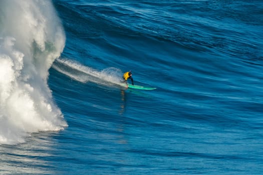 NAZARE, PORTUGAL - DECEMBER 20, 2016: Alex Botelho (PRT) during the Nazare Challenge 2016 - Big Wave Tour #3 at Praia do Norte - Nazare, Portugal.