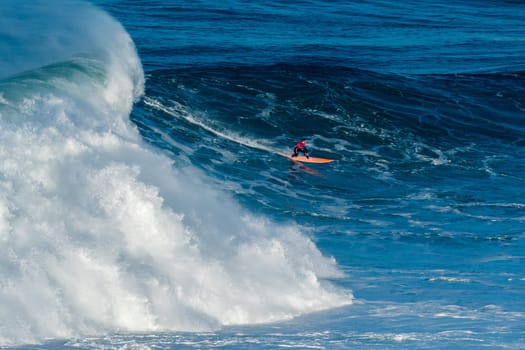 NAZARE, PORTUGAL - DECEMBER 20, 2016: Nic Lamb (USA) during the Nazare Challenge 2016 - Big Wave Tour #3 at Praia do Norte - Nazare, Portugal.