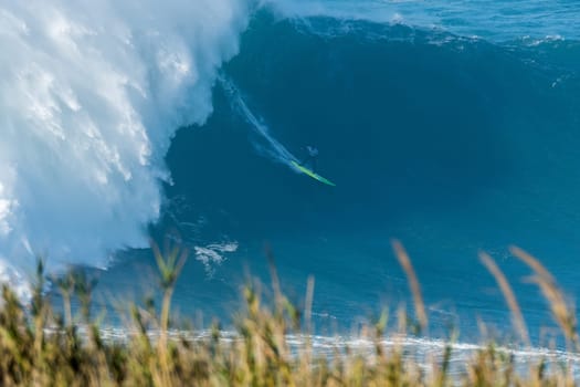NAZARE, PORTUGAL - DECEMBER 20, 2016: Jamie Mitchell (AUS) during the Nazare Challenge 2016 - Big Wave Tour #3 at Praia do Norte - Nazare, Portugal.