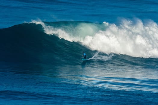 NAZARE, PORTUGAL - DECEMBER 20, 2016: Grant Baker (ZAF) during the Nazare Challenge 2016 - Big Wave Tour #3 at Praia do Norte - Nazare, Portugal.