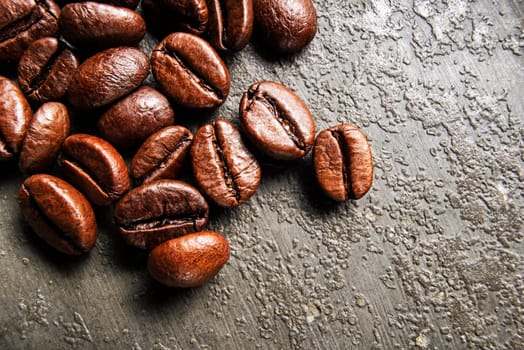 Coffee beans on gray background on close up