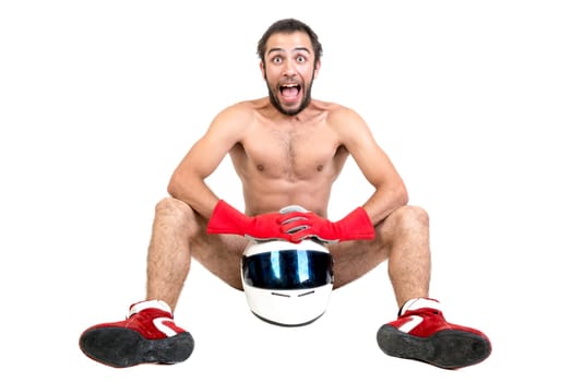 Funny naked racing driver posing with helmet isolated in white