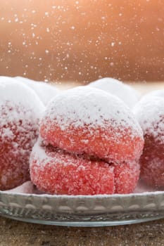 Close up colorful cookies dessert with vintage pastel tone and snowing sugar
