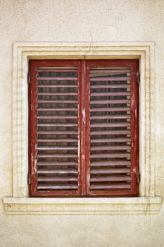 Window Closed with Wooden Shutters