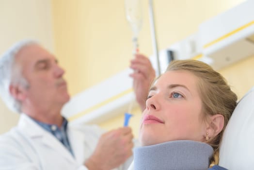 nurse checking perfusion
