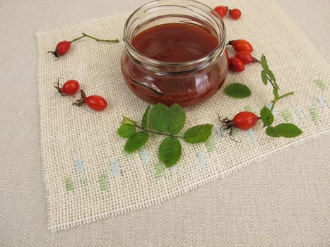 Homemade rosehip jam in a glass