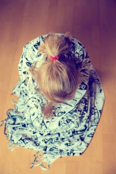 little girl is in bad mood- from above