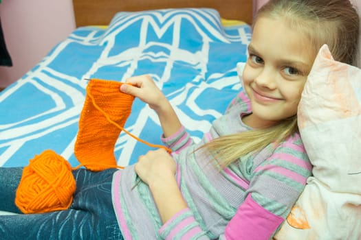 Girl smiling showing associated scarf