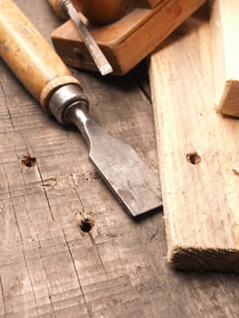 Wood worker tools on an old wooden table