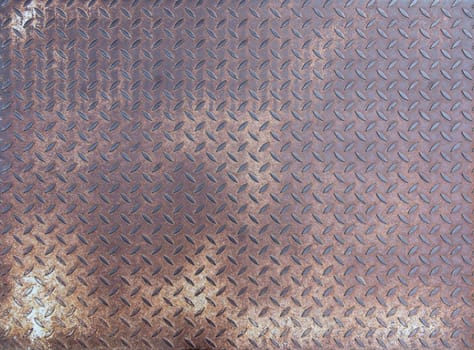 Used diamond rusty steel plate - grunge texture
