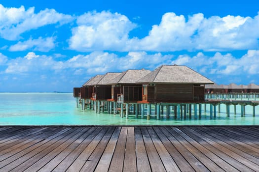 beach with water bungalows at Maldives..